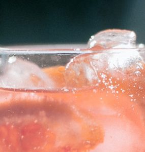 Pink grapefruit juice & tonic with ice